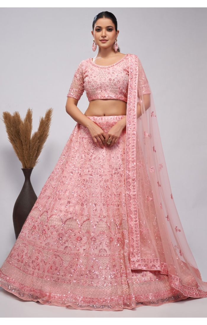 Blush Pink Net Lehenga with Intricate Embroidery and Sheer Dupatta for Weddings