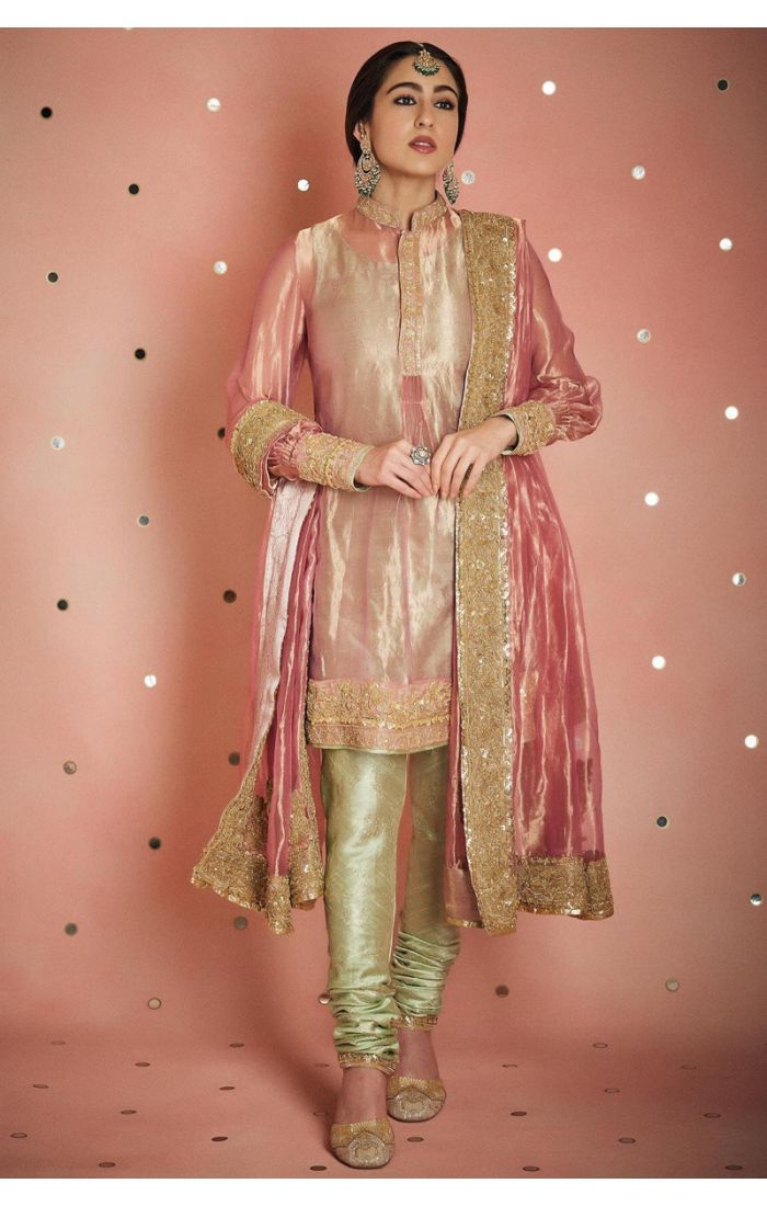 Blush Pink Silk Embroidered Salwar Suit with Golden Embroidery for Eid Celebrations.