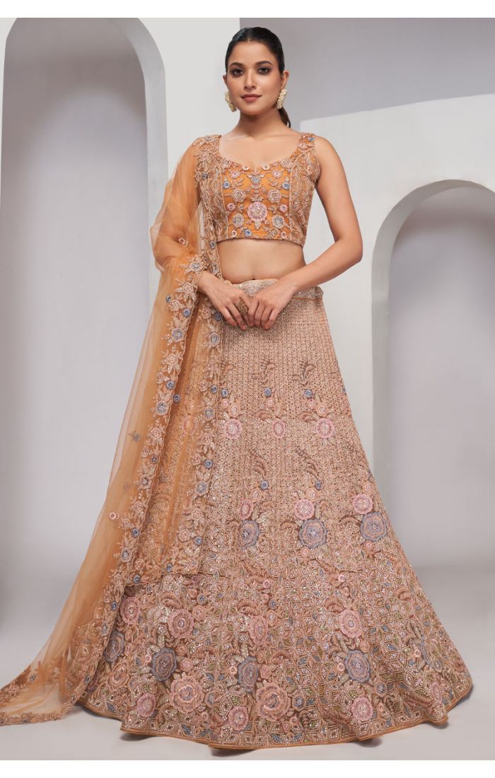 Designer embroidered lehenga choli for UK weddings and celebrations.