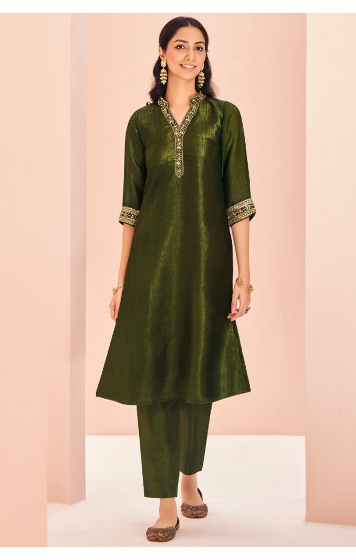 Elegant Green Silk Kurti with Embroidered Detailing for Eid Celebrations.