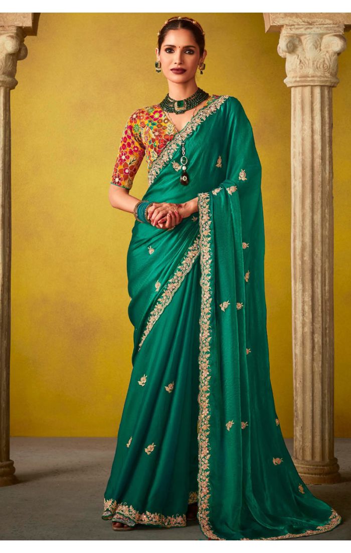 Emerald Green Floral Embroidered Silk Saree with vibrant multicolor blouse for Eid and festive occasions.