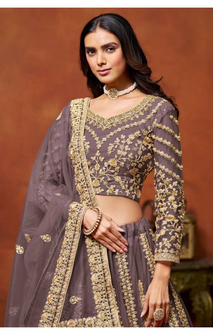 Mauve Embroidered Net Lehenga with Golden Detailing - Perfect for Weddings and Festive Occasions