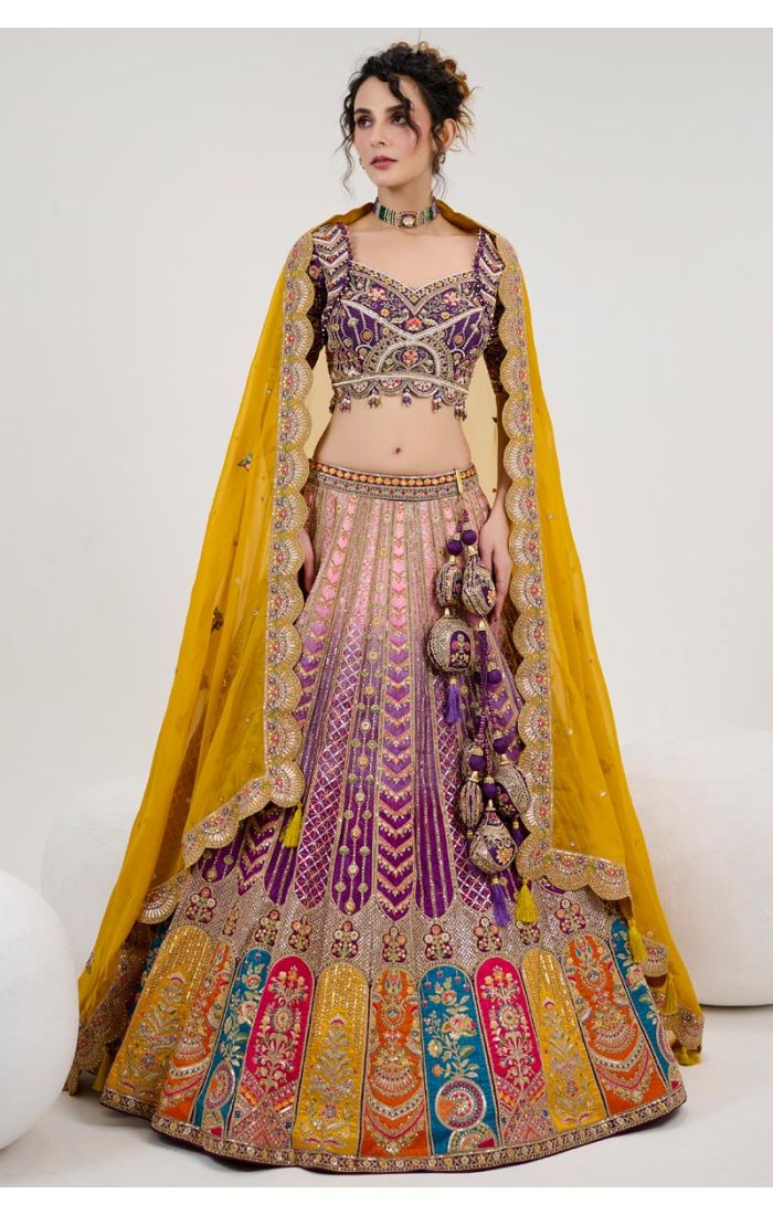 Multicolor bridal lehenga with Zardosi embroidery, perfect for weddings and festive occasions. Designed with premium silk fabric and vibrant traditional motifs.