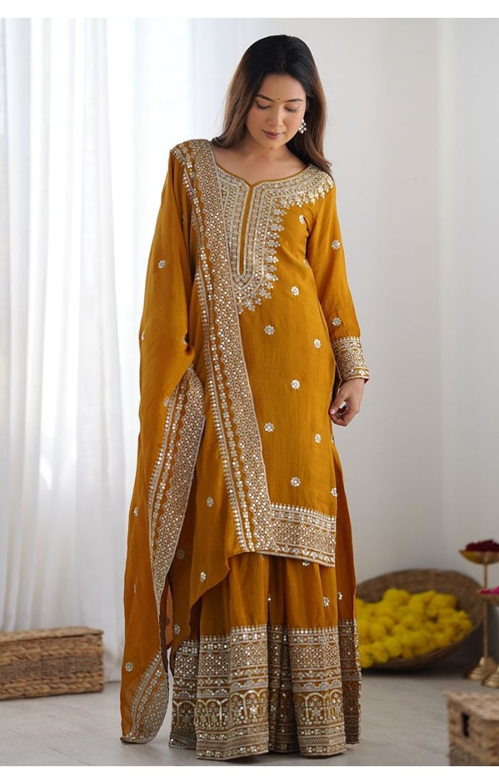 Mustard Chinon Silk Sharara Suit with handcrafted mirror, zari, and sequins embroidery – perfect for Eid, wedding, and festive occasions