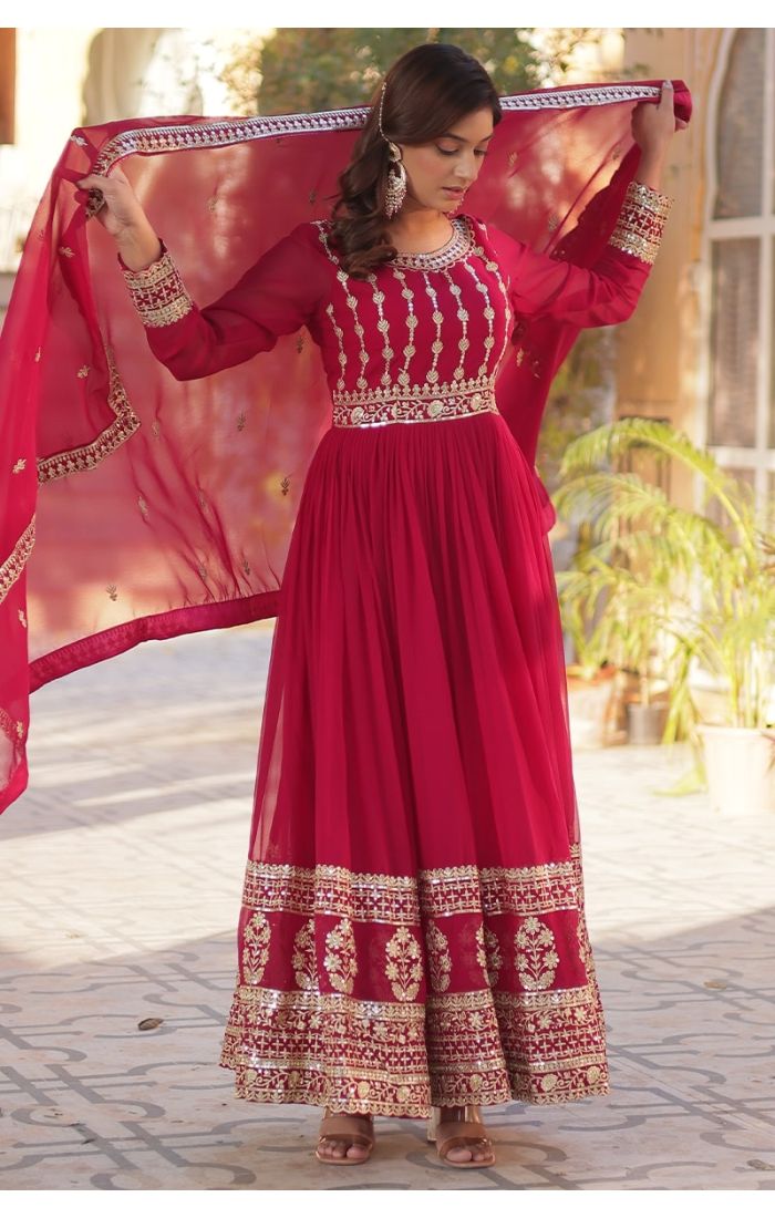  Ruby red Georgette Anarkali suit with golden embroidery, ideal for weddings and festive occasions.