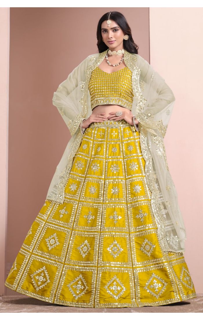 Elegant Yellow Mirror Work Silk Lehenga Choli Set with Net Dupatta - Perfect for Weddings, Festive Celebrations & Special Occasions.