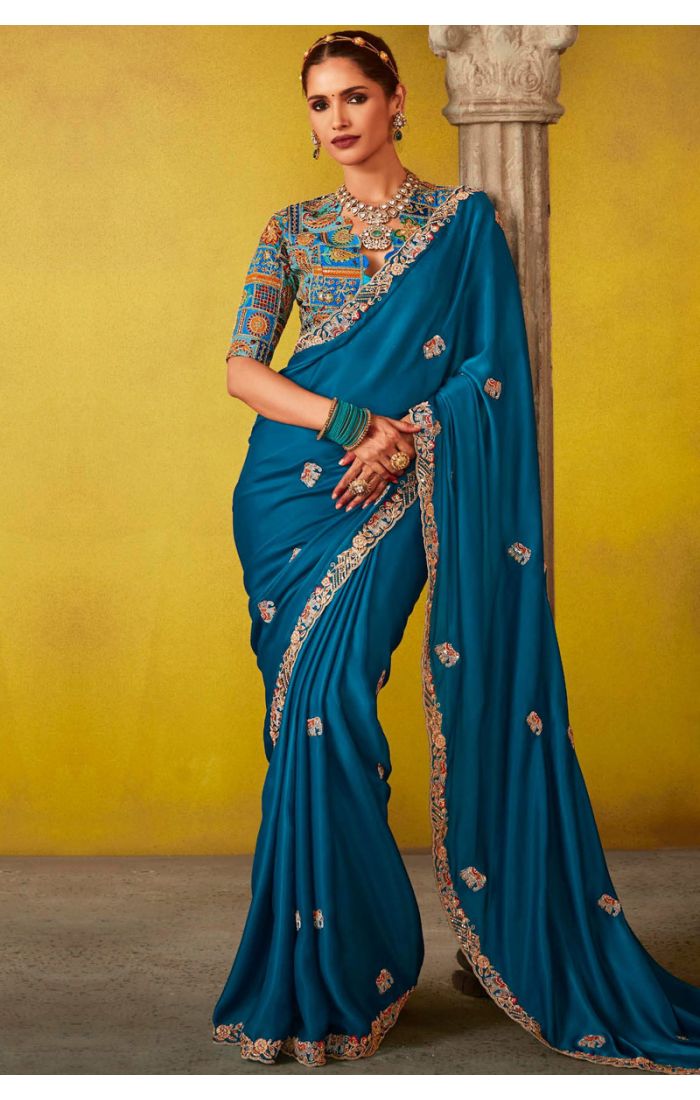 Royal Blue Georgette Saree with Intricate Hand Embroidery.