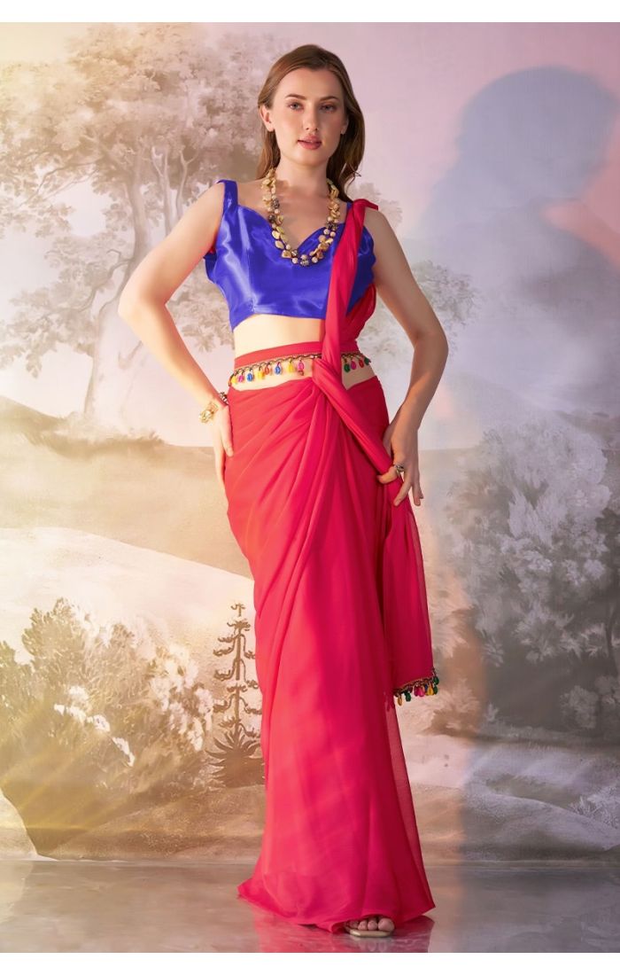 Elegant Royal Fuchsia Chiffon Saree with Blue Blouse and Tassel Detailing – Perfect for Weddings & Festive Wear