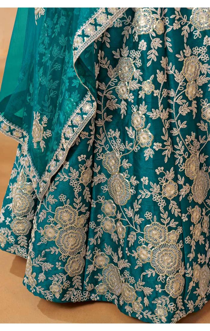 Teal Embroidered Lehenga Choli Set with intricate floral embroidery, matching blouse, and lightweight dupatta for weddings and festive occasions worldwide.